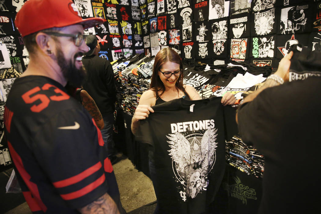 Customer Michelle Foulks, center, of Salt Lake City, Utah, shops for a shirt at the Latino's Ro ...