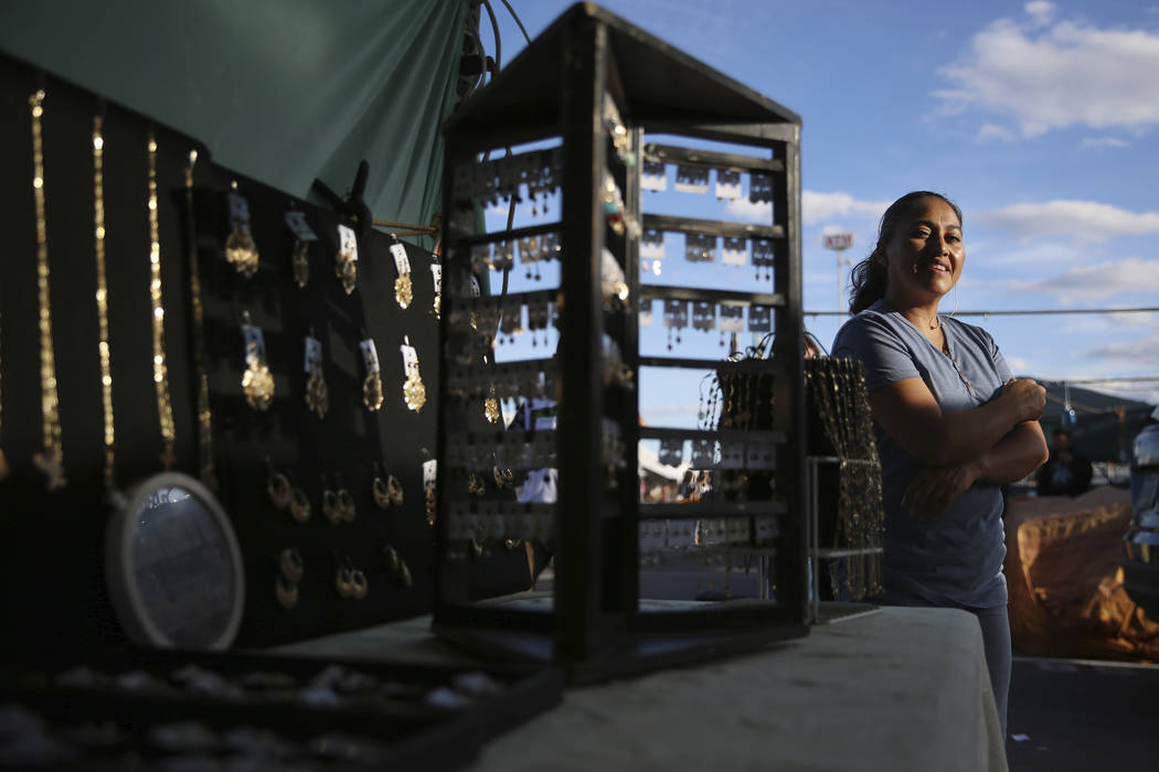 Vendor Rosario Malvaez stands in front her her jewelry booth at the Broadacres Marketplace in N ...