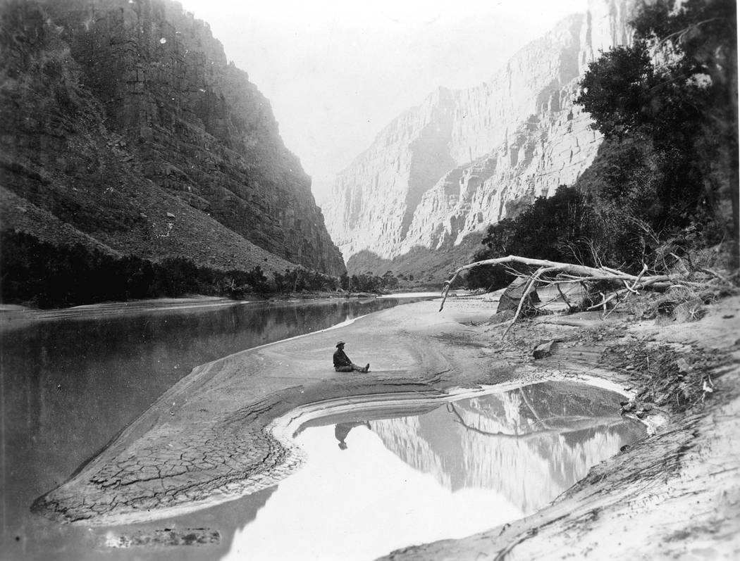 2ND POWELL EXPEDITION. DELLENBAUGH SEATED & REFLECTED IN GREEN RIVER. LADORE CANYON. GRCA 1 ...