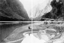 A man is seated by and reflected in the Green River in Lodore Canyon on John Wesley Powell's se ...