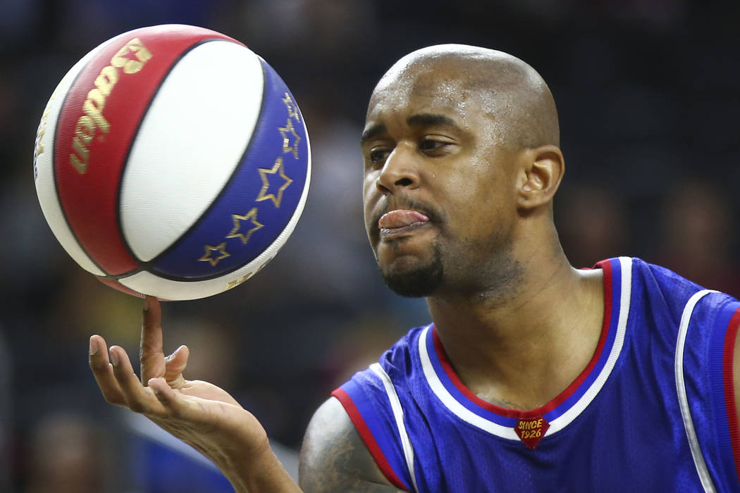 Harlem Globetrotters guard Shane "Scooter" Christensen (16), a native of Las Vegas, s ...