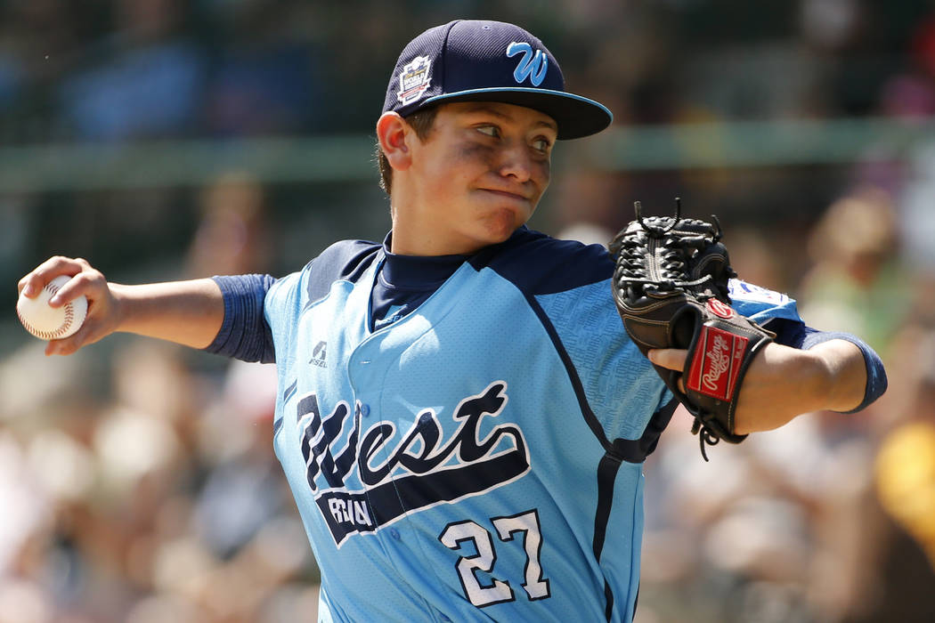 Las Vegas pitcher Brennan Holligan (27) delivers during the first inning of a baseball game aga ...