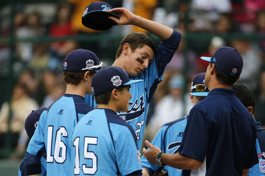 Las Vegas pitcher Brennan Holligan collects himself on the mound in the second inning of the Un ...