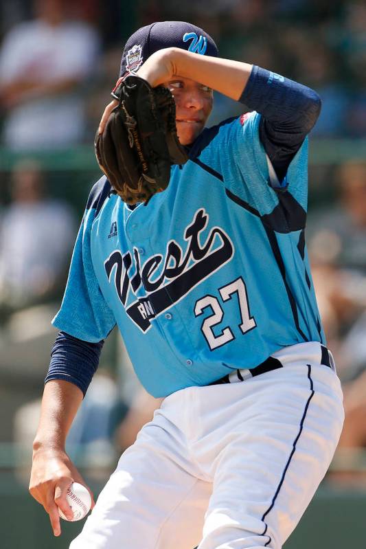 Las Vegas pitcher Brennan Holligan (27) delivers during the first inning of a baseball game aga ...