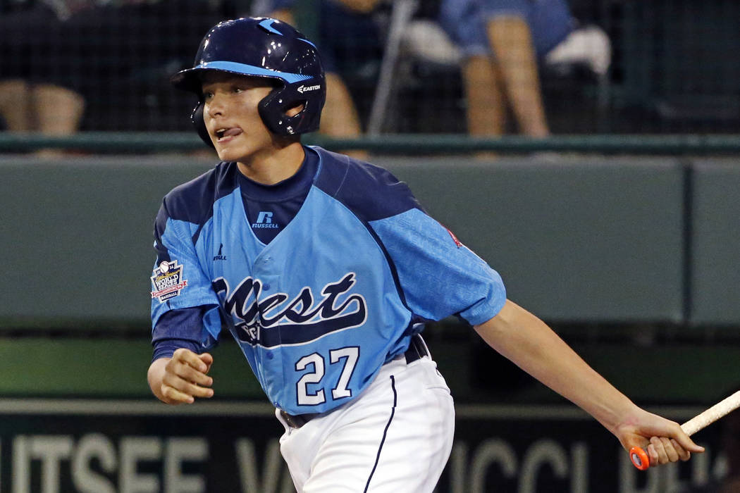 Las Vegas' Brennan Holligan (27) drives in two runs with a double during the fourth inning of a ...