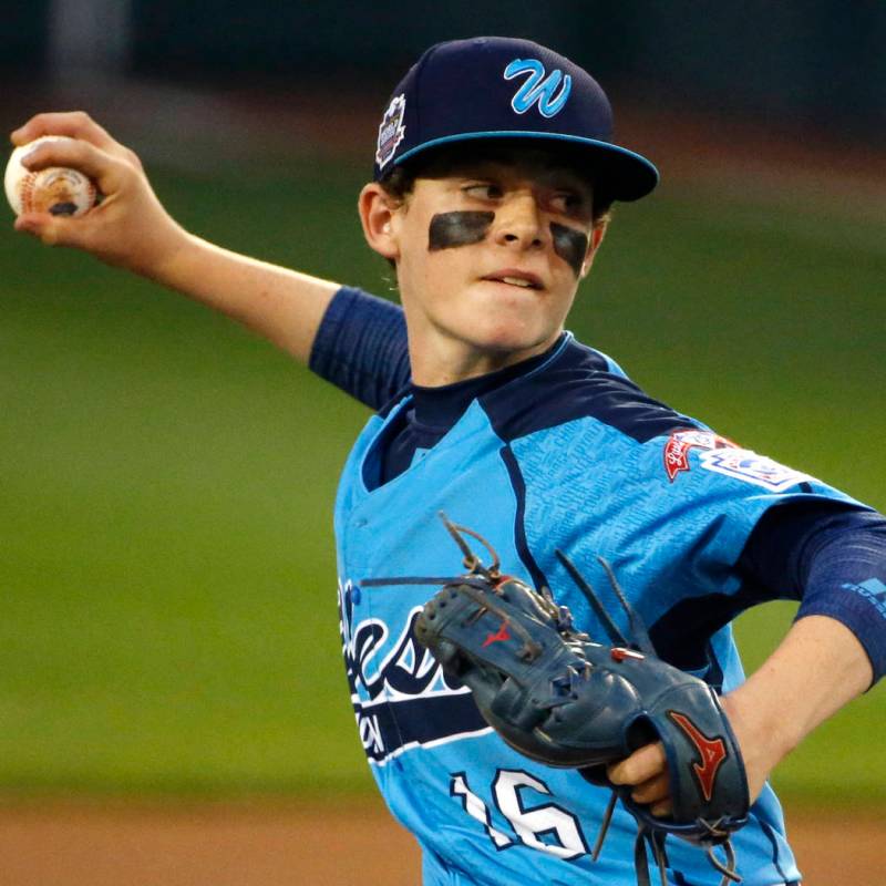 Las Vegas pitcher Brad Stone delivers during the first inning of a United States semi-final bas ...