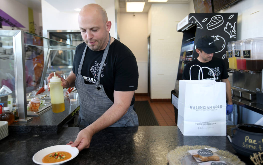 Chef and co-owner Jeffrey Weiss serves Gazpacho at Valencian Gold in Las Vegas Thursday, J ...