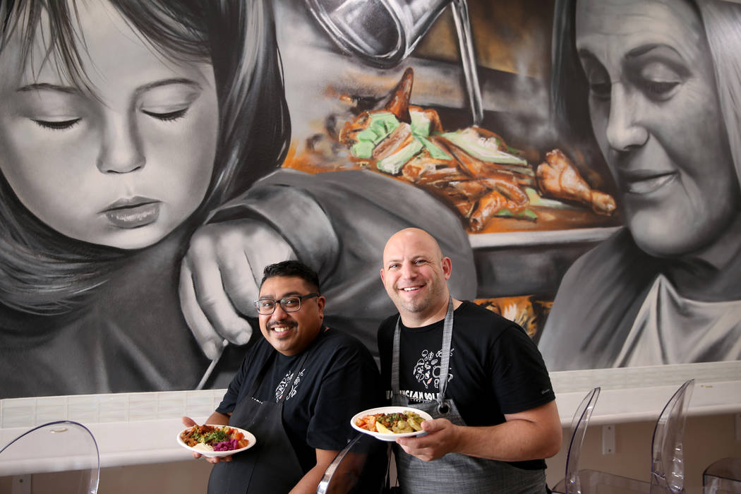 Paras Shah, left, and Jeffrey Weiss, both chefs and co-owners, at Valencian Gold in Las Vegas T ...