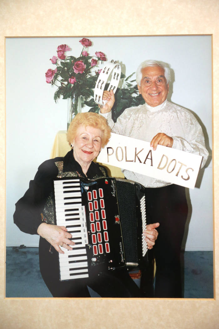 A photo from the book of Etta Baykara, 91, left, with her husband Joe, 93, shown at her home in ...