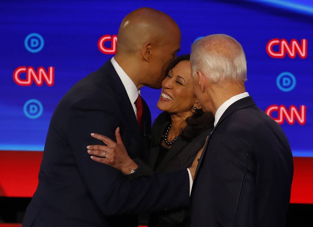 Sen. Cory Booker, D-N.J., former Vice President Joe Biden and Sen. Kamala Harris, D-Calif., tal ...