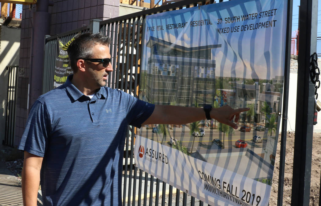 Joe Yakubik, president Assured Development, leads a tour of his projects on South Water Street ...