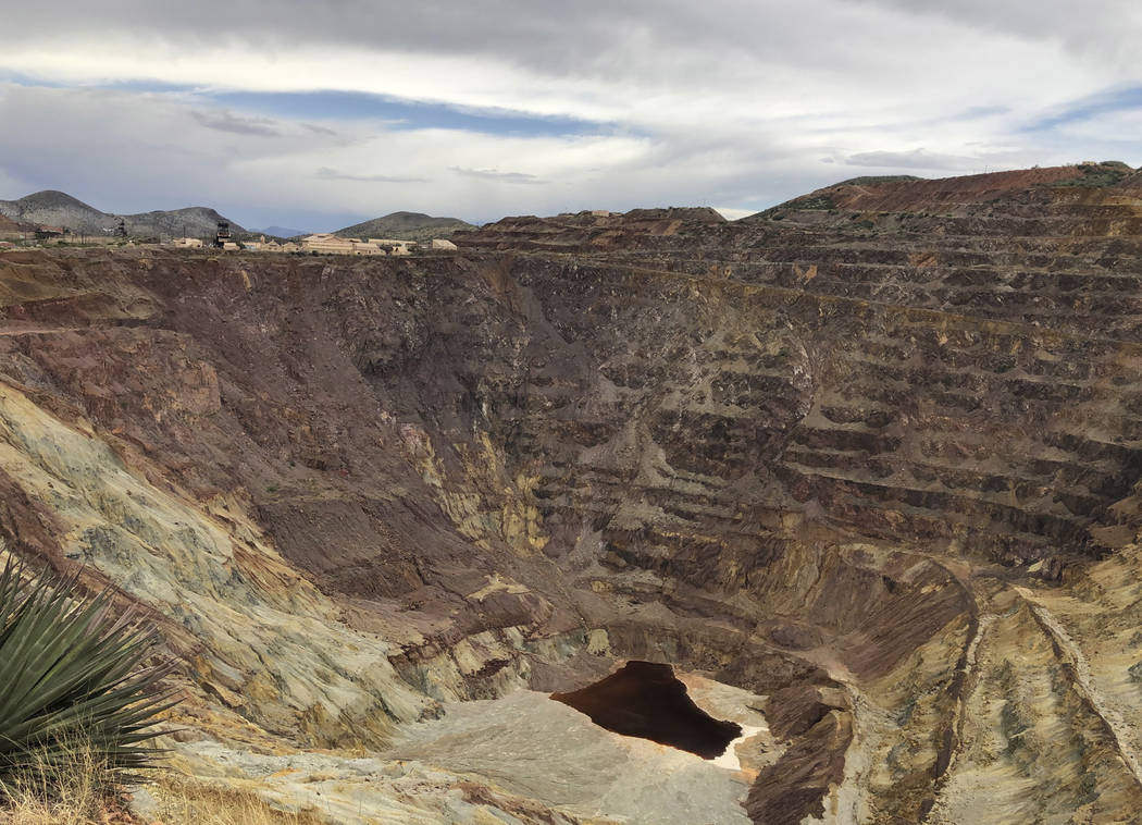 FILE - This, May 12, 2019 file photo, shows what's left of the Lavender pit mine outside the so ...