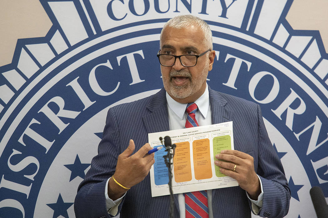 In this Tuesday, July 30, 2019 photo, Salt Lake County District Attorney Sim Gill talks about t ...