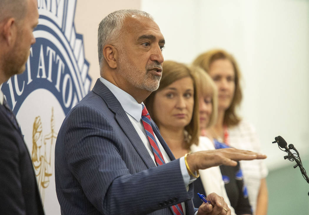 In this Tuesday, July 30, 2019 photo, Salt Lake County District Attorney Sim Gill talks about t ...