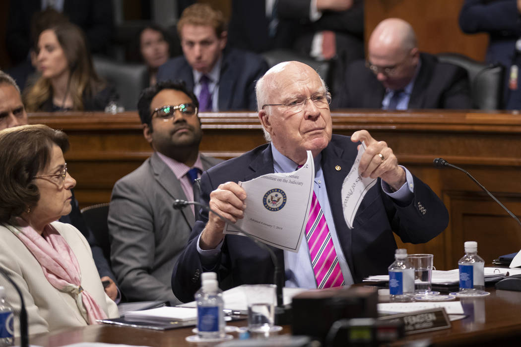 Sen. Patrick Leahy, D-Vt., a former chairman of the Senate Judiciary Committee, joined at left ...