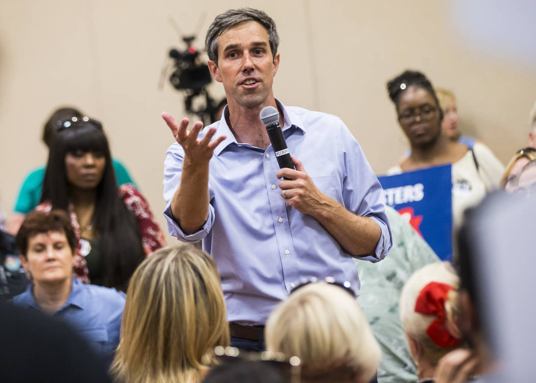 Democratic presidential candidate and former Texas congressman Beto O'Rourke responds to an att ...