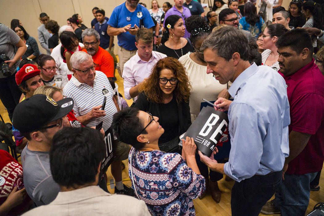 Democratic presidential candidate and former Texas congressman Beto O'Rourke talks with support ...