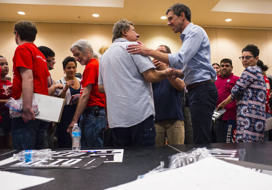 Democratic presidential candidate and former Texas congressman Beto O'Rourke talks with support ...