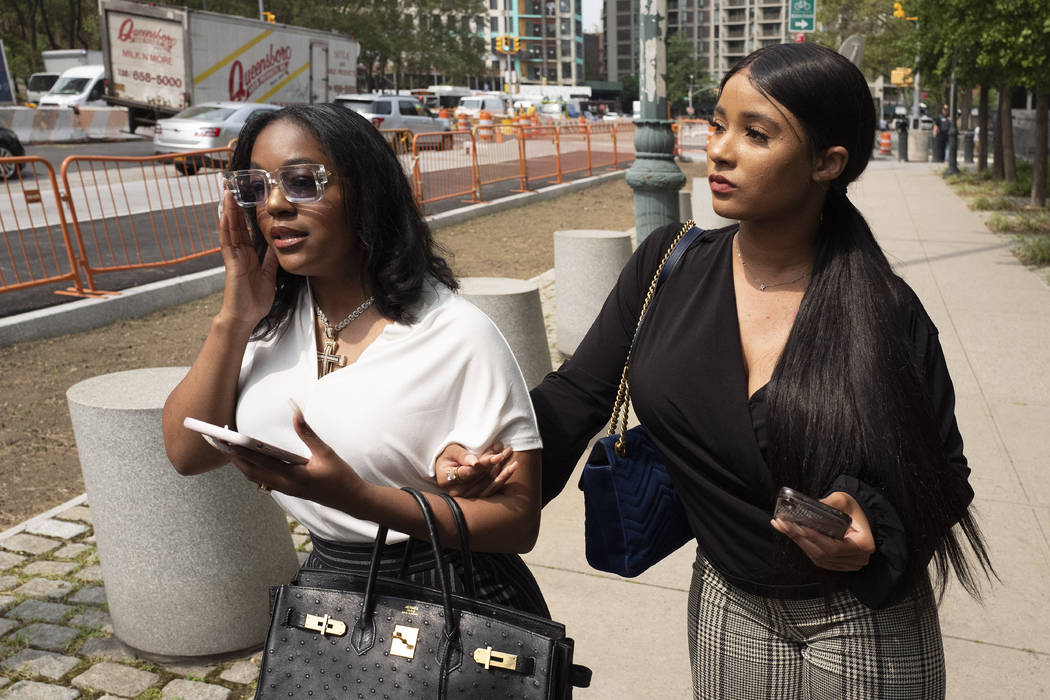 Azriel Clary, left, and Joycelyn Savage, two women who lived in Chicago with R&B singer R. Kell ...