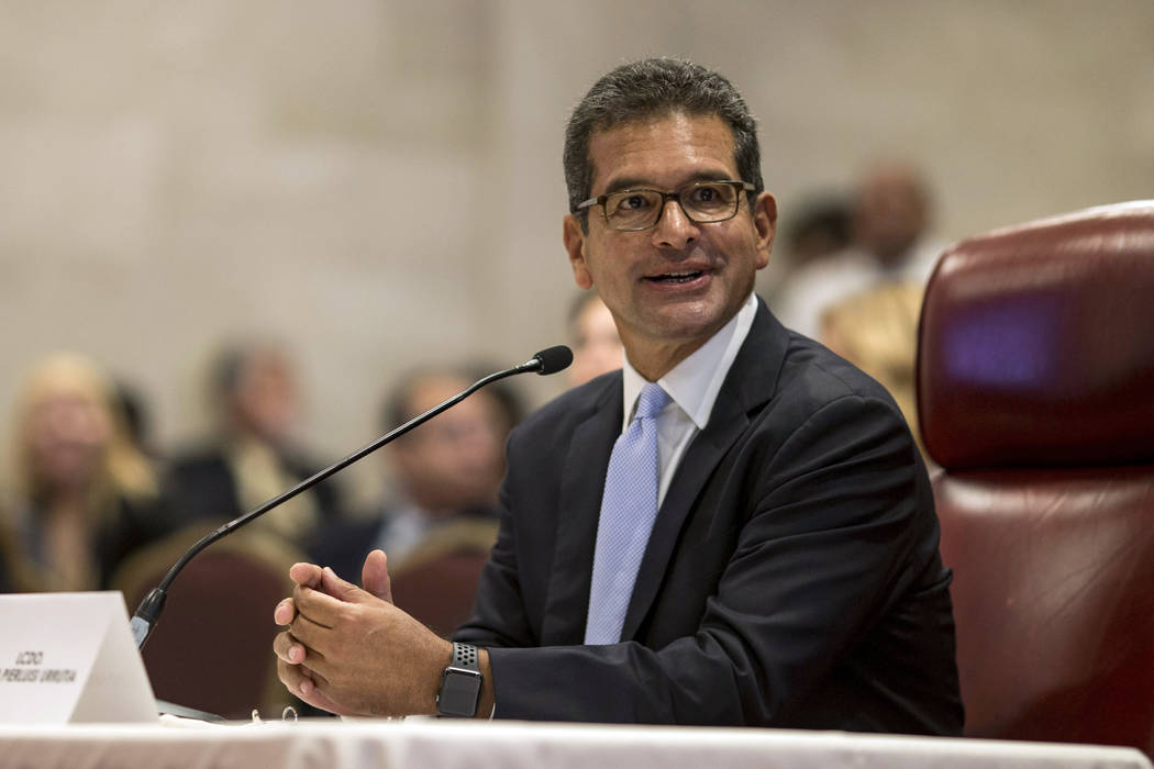 Proposed Secretary of State Pedro Pierluisi arrives to his confirmation hearing at the House of ...