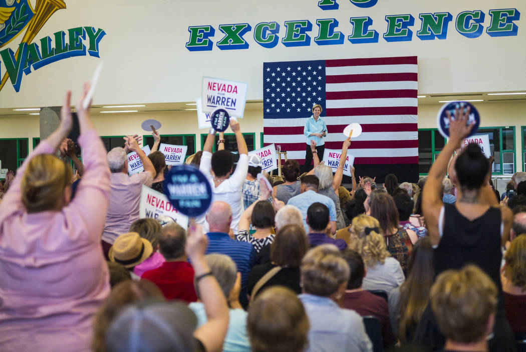 Attendees cheer as Democratic presidential candidate Sen. Elizabeth Warren, D-Mass., speaks dur ...