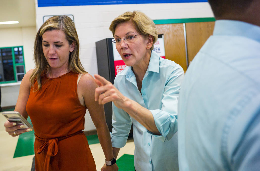 Democratic presidential candidate Sen. Elizabeth Warren, D-Mass., navigates the crowd after spe ...