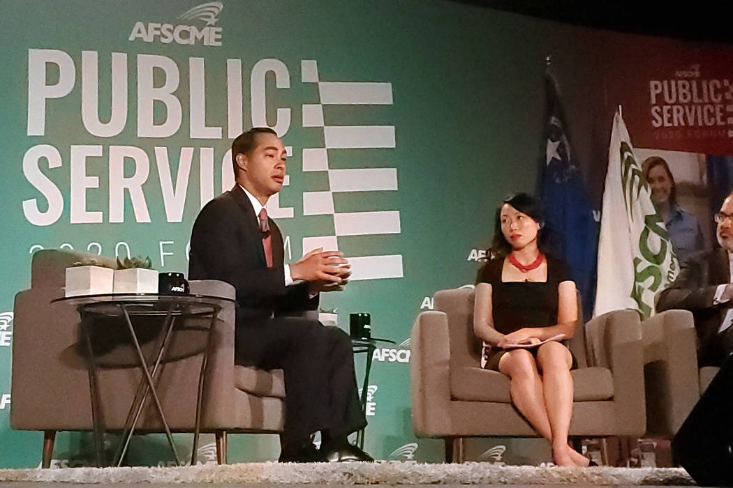 Former Housing and Urban Development Secretary Julián Castro, left, speaks at the American Fed ...