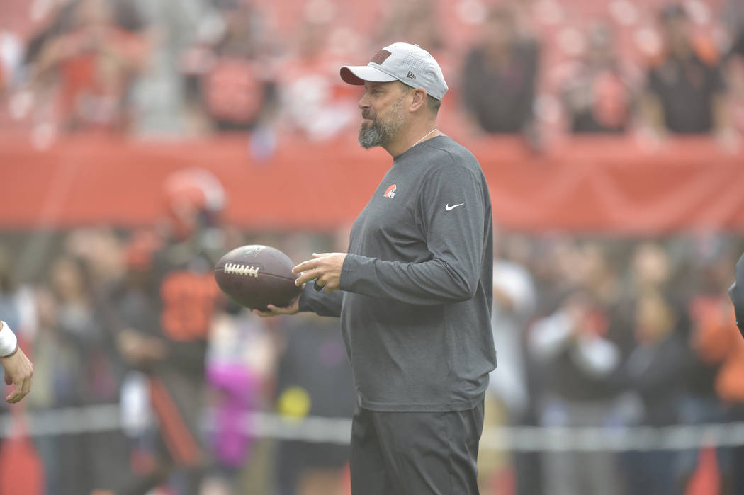 Cleveland Browns offensive coordinator Todd Haley stands on the field before an NFL football ga ...