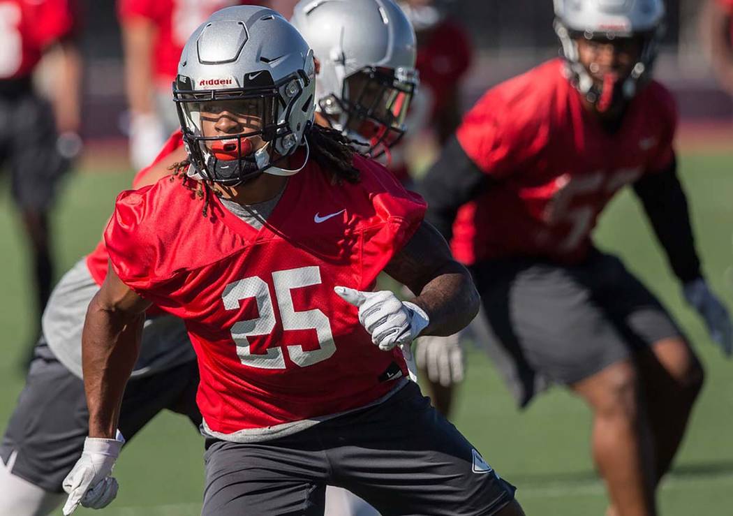 UNLV defensive end/linebacker Gabe McCoy (25) works through drills during the first day of trai ...