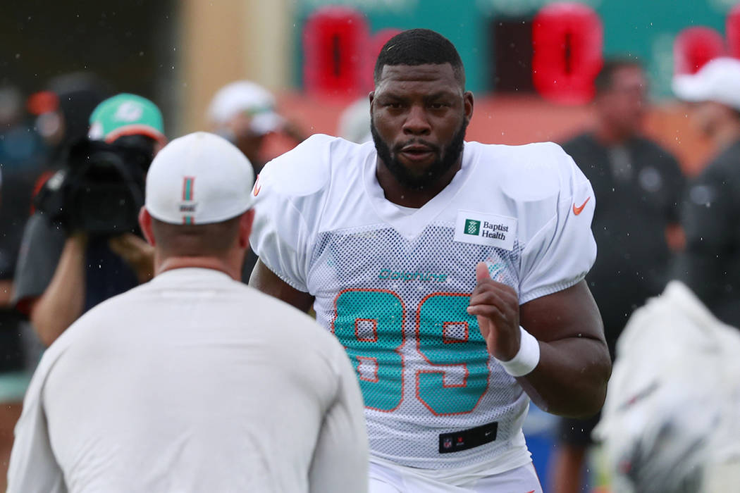 Miami Dolphins tight end Dwayne Allen runs drills at the teams NFL football training camp, Thur ...