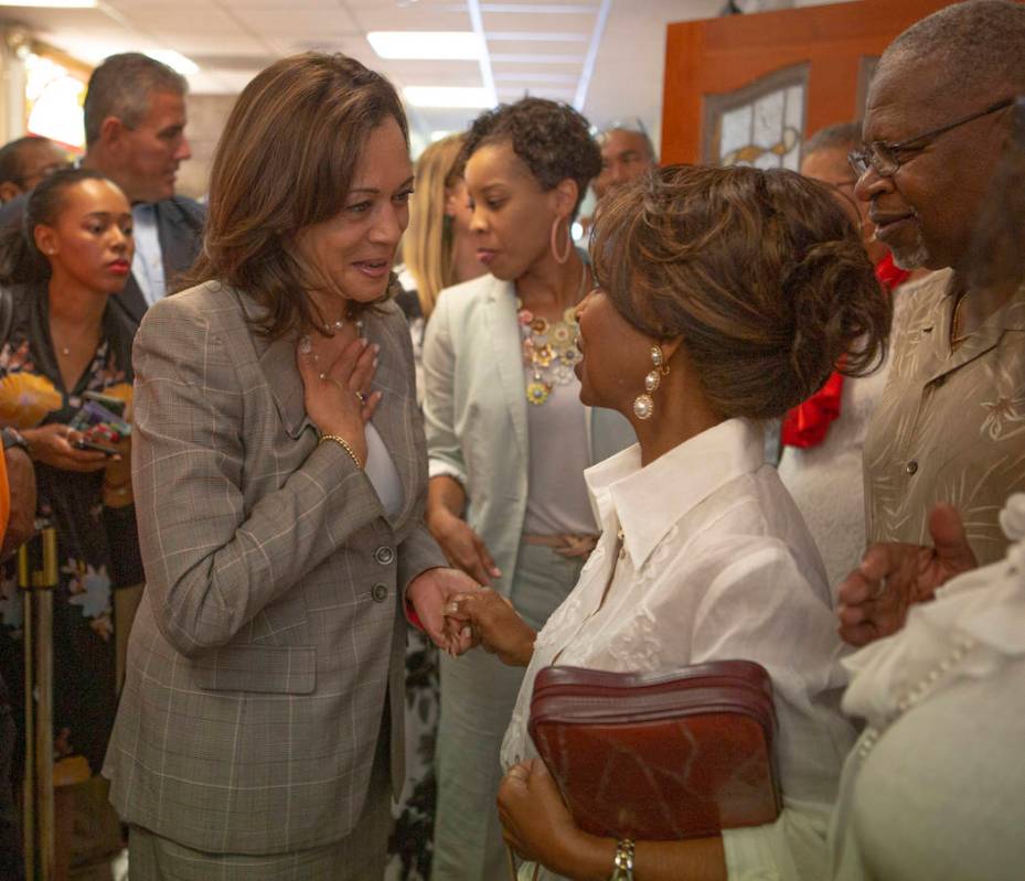 Democratic presidential candidate and Sen. Kamala Harris, D-Calif., greets church att ...