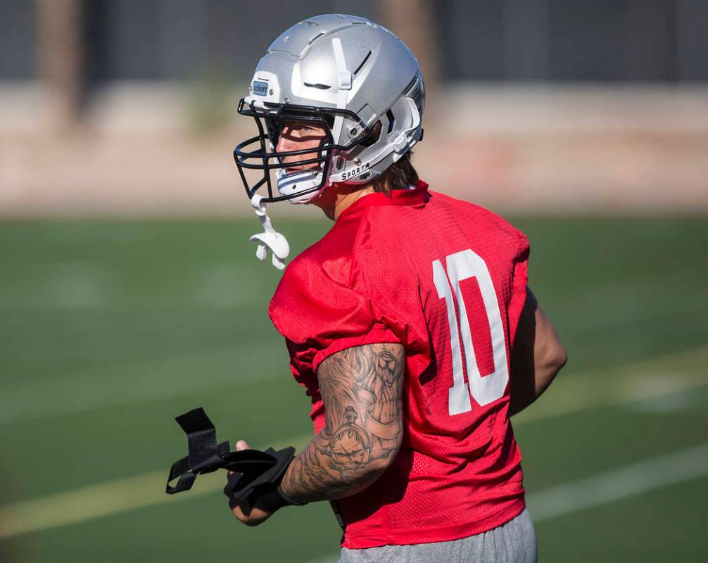 UNLV linebacker Vic Viramontes (10) works through drills during the first day of training camp ...