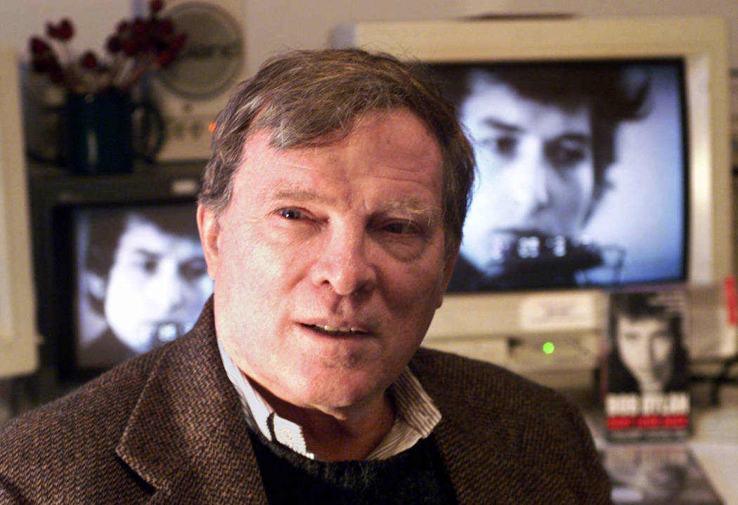 In this Jan. 27, 2000 file photo, documentary filmmaker D.A. Pennebaker is flanked by 35-year-o ...