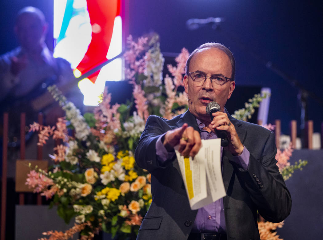 Rev. Doug Foglesong speaks to the congregation and welcomes Democratic presidential candidate M ...