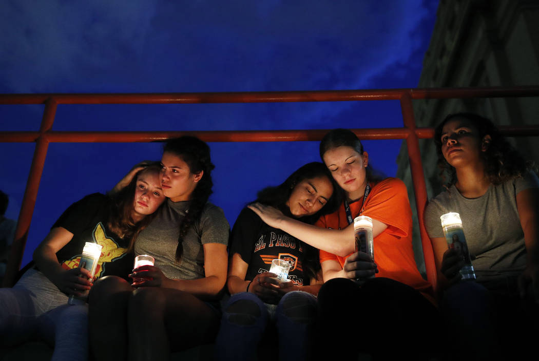 From left, Melody Stout, Hannah Payan, Aaliyah Alba, Sherie Gramlich and Laura Barrios comfort ...