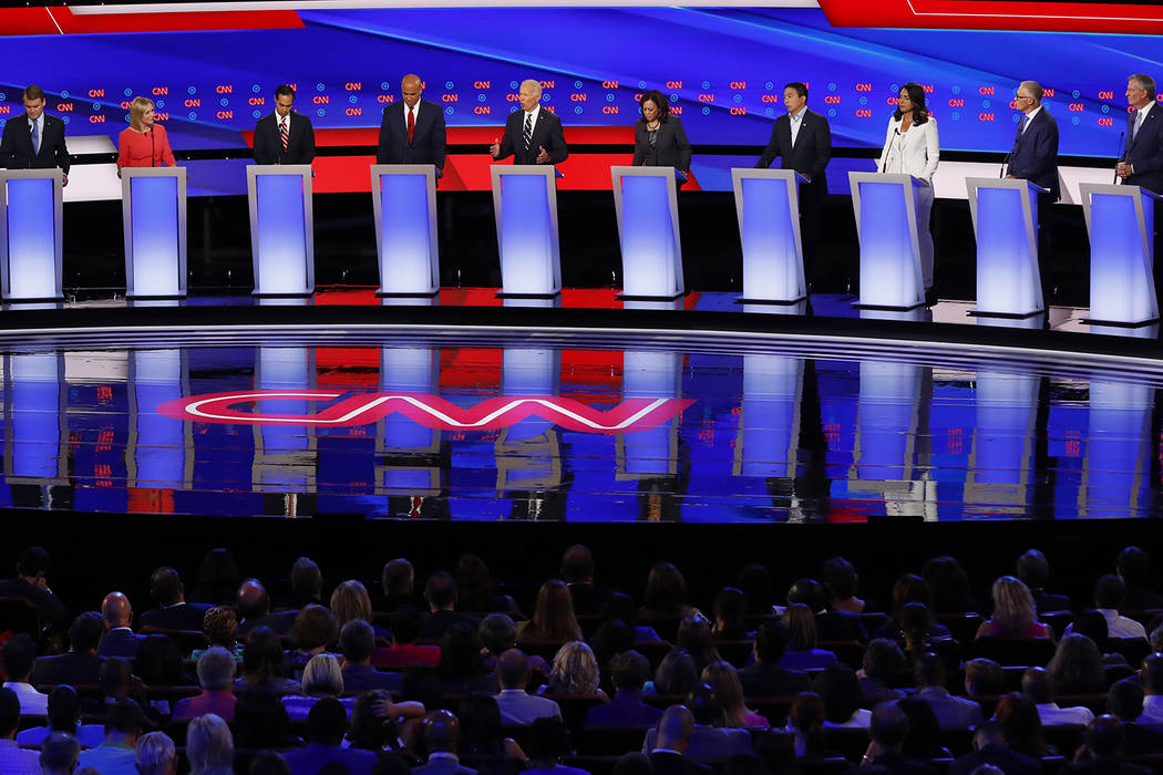 From left, Sen. Michael Bennet, D-Colo., Sen. Kirsten Gillibrand, D-N.Y., former Housing and Ur ...