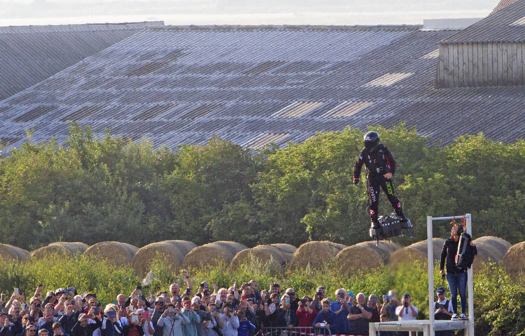 Franky Zapata, a 40-year-old inventor, takes to the air in Sangatte, Northern France, at the st ...