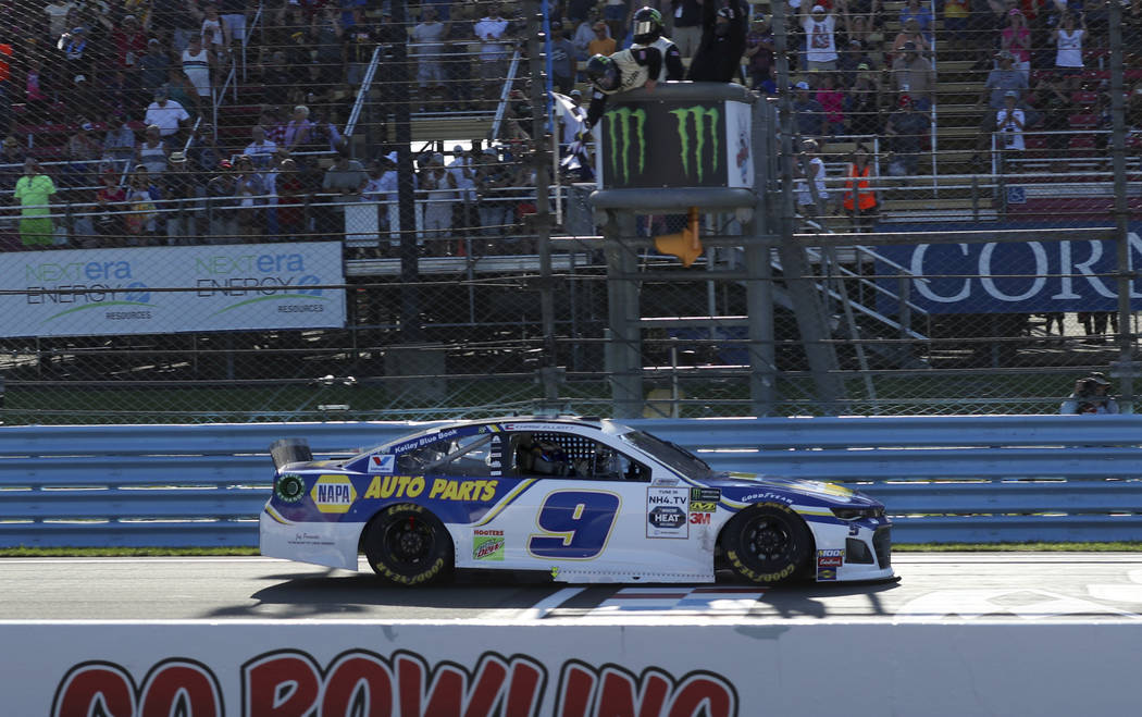 Chase Elliott crosses the finish line to win a NASCAR Cup Series auto race at Watkins Glen Inte ...