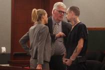 Gregory Wallen listens to attorneys Julia Murray and Scott Coffee during his court hearing at t ...
