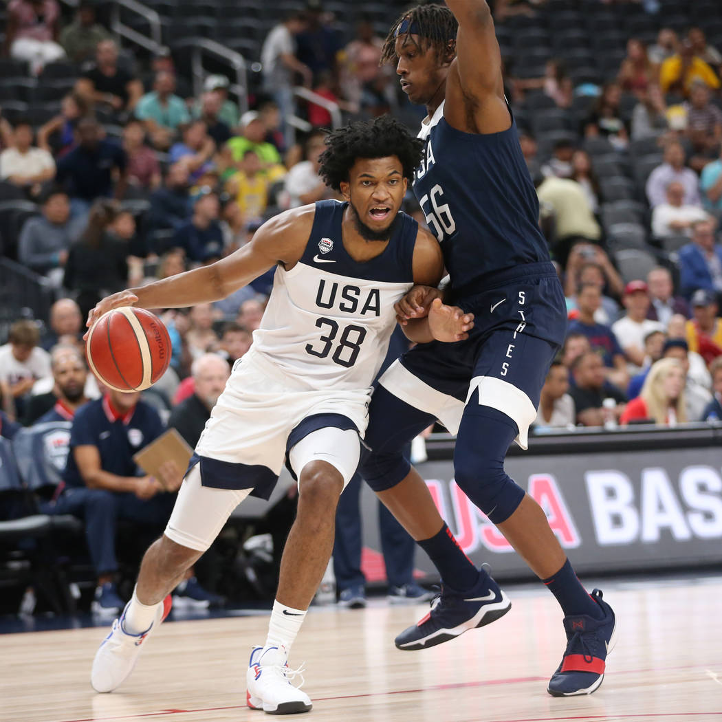 USA Men's National Team White forward Marvin Bagley III (38) dribbles the ball under pressure f ...
