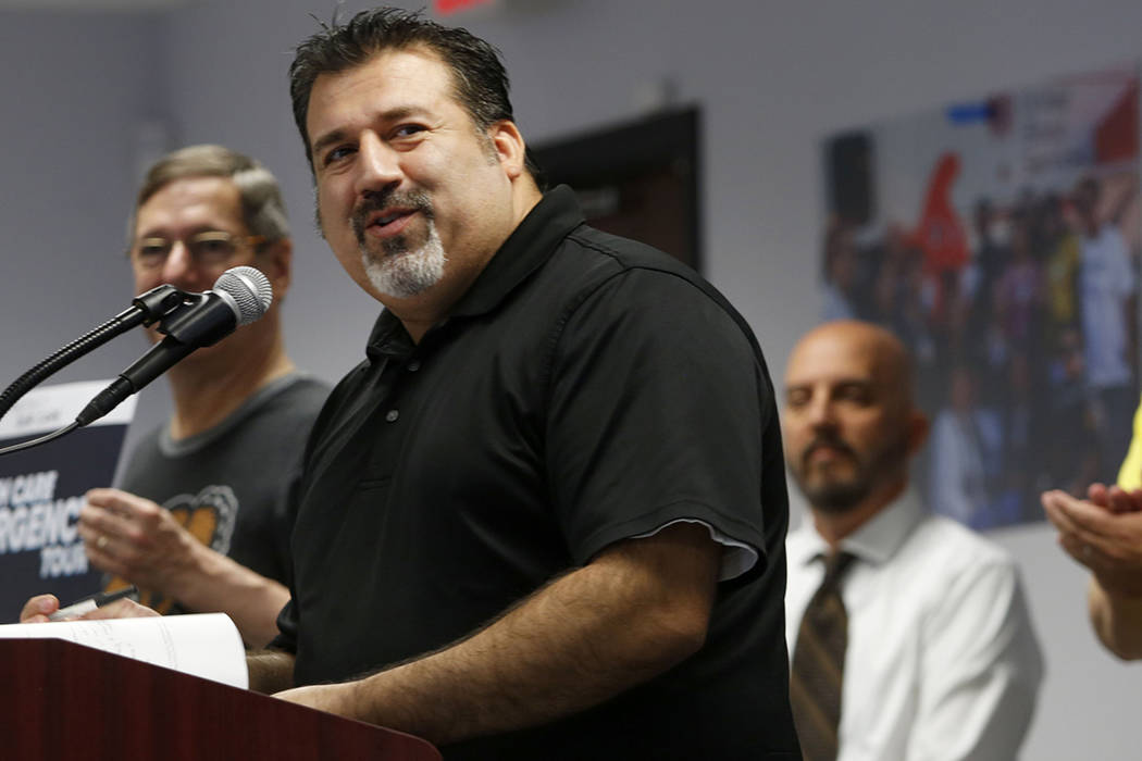 Nevada Director of Protect Our Care Andres Ramirez introduces U.S. Rep. Susie Lee during the Pr ...