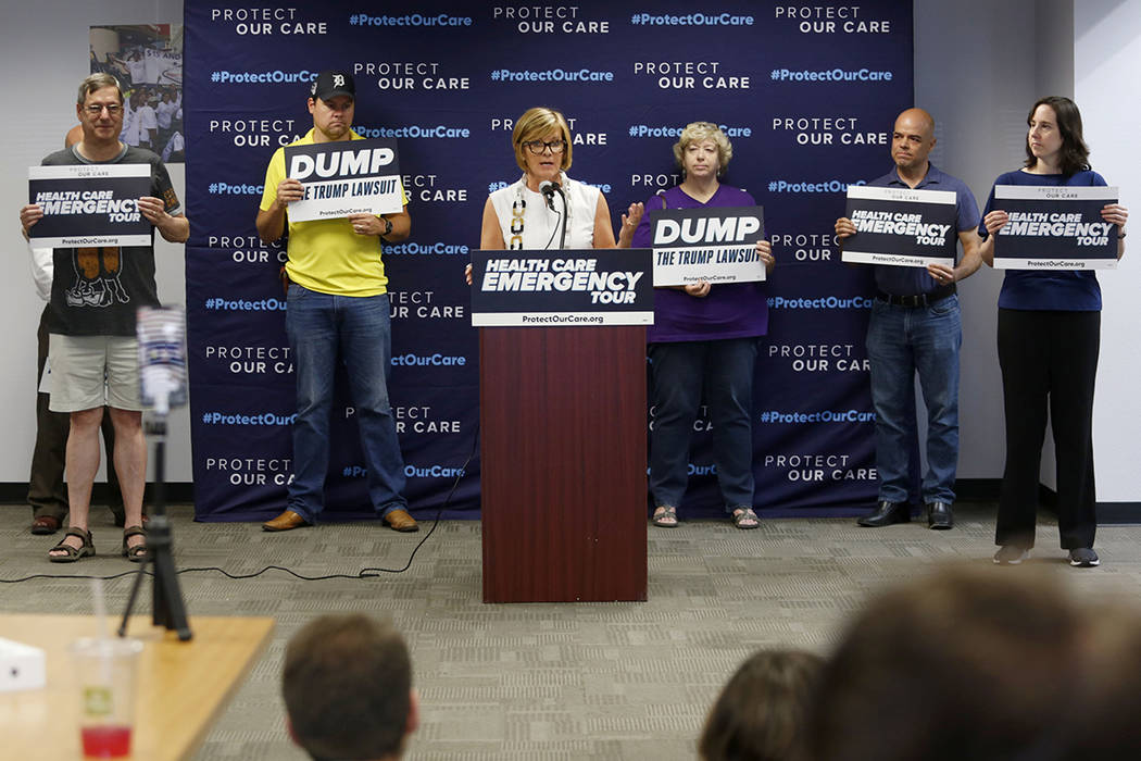 U.S. Rep. Susie Lee, D-Nev., speaks during the Protect Our Care's nationwide bus tour kick off ...