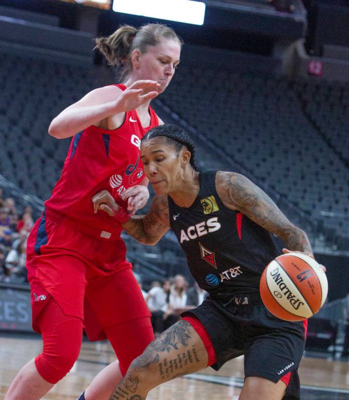 Las Vegas Aces guard Tamera Young (1) takes a step back for a two-pointer against Washington My ...