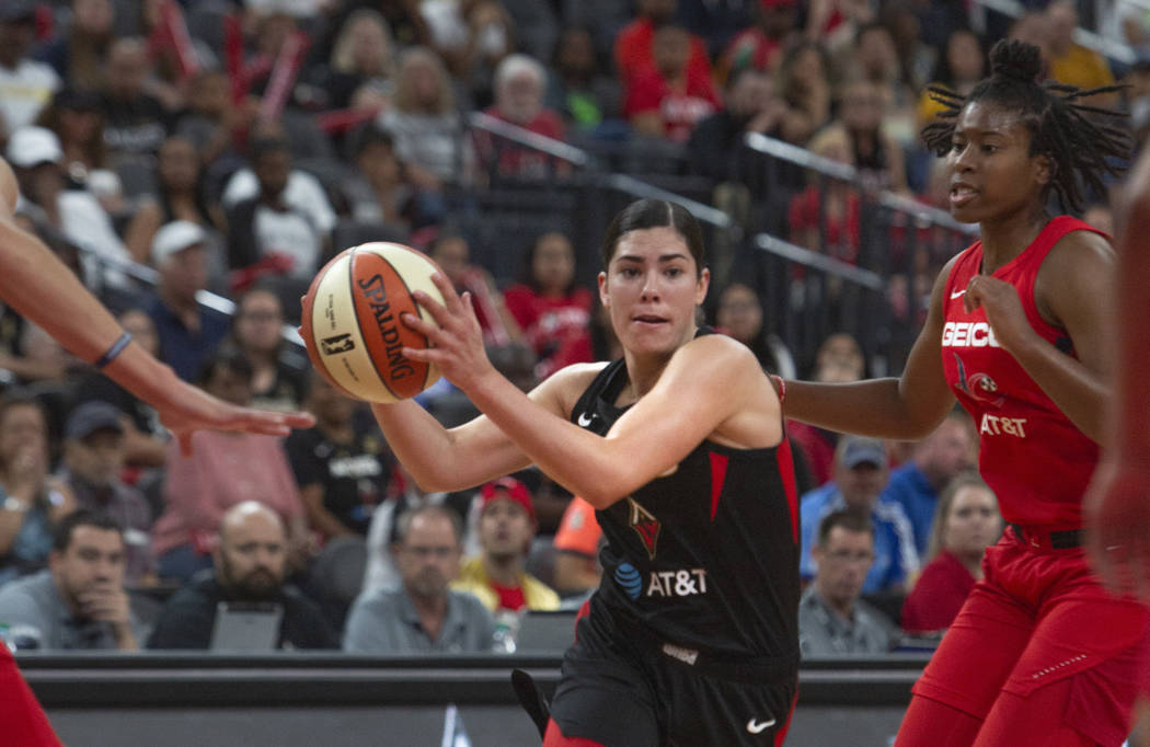 Las Vegas Aces guard Kelsey Plum (10), takes the ball to the hoop for a layup against Washingto ...
