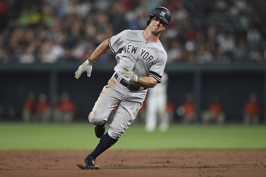 New York Yankees' Brett Gardner runs to third on a single by Mike Tauchman against the Baltimor ...