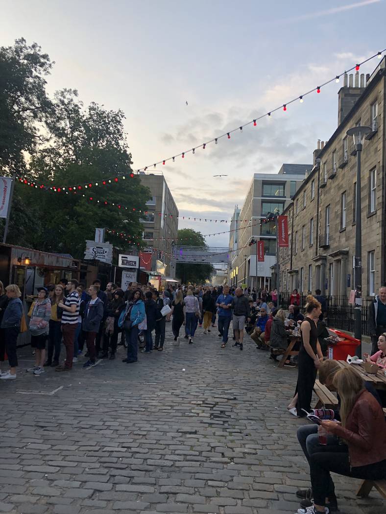 The cobblestone walkway leading into the Edinburgh Festival Fringe on Monday, Aug. 5, 2019. (Jo ...