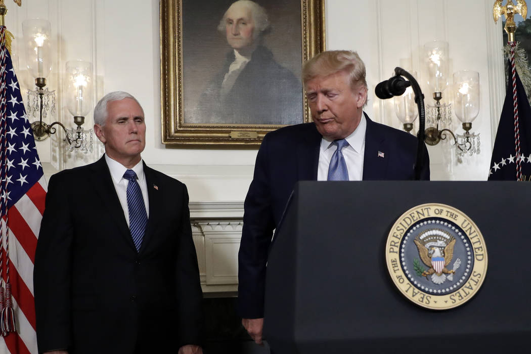 President Donald Trump walks away after speaking about the mass shootings in El Paso, Texas and ...