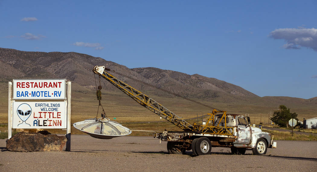 A spaceship hanging from a tow truck marks the entrance to the Little A'Le'Inn which is to be a ...