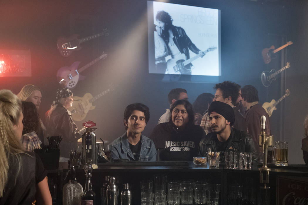 Viveik Karla, left, director Gurinder Chadha and Aaron Phagura on the set of "Blinded by the Li ...