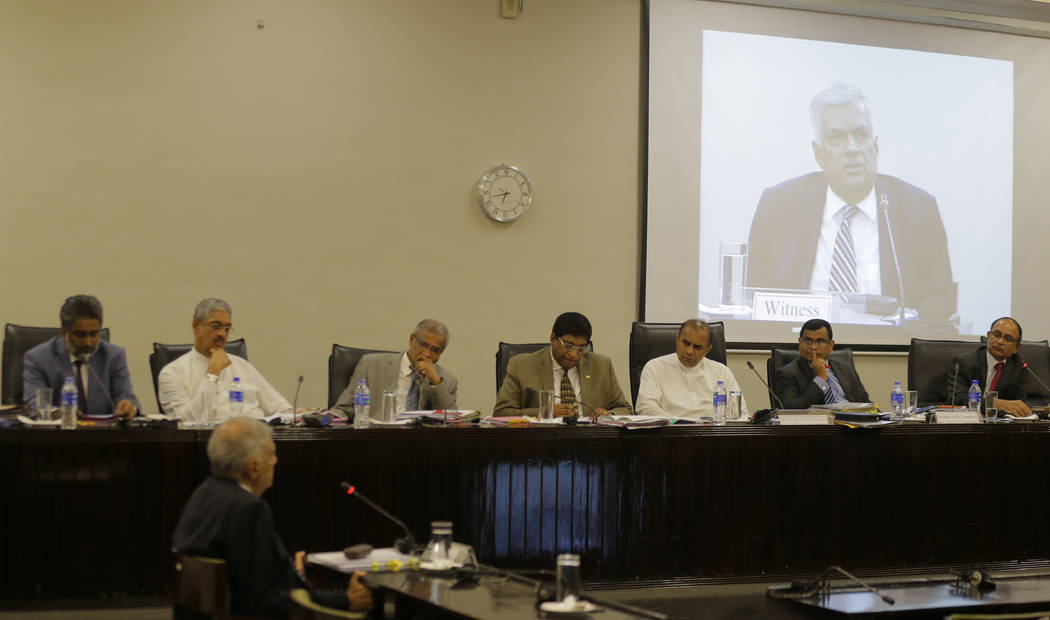 Sri Lankan Prime Minister Ranil Wickremesinghe testifies in front of a parliamentary committee ...